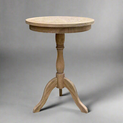 Experience timeless beauty in simplicity with the Provence Weathered Oak Side Table. Handcrafted from solid oak, this versatile piece is perfect for any living room or bedroom. Featuring a round table top and a carved base column, it adds warmth and organic charm to any space.