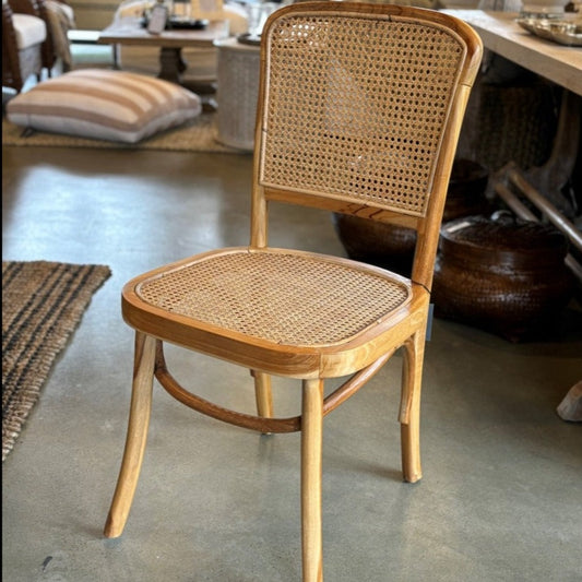 Crafted with high-quality teak wood and rattan, the Kursi Chair has a traditional form that feels warm and welcoming and is also extremely comfortable.