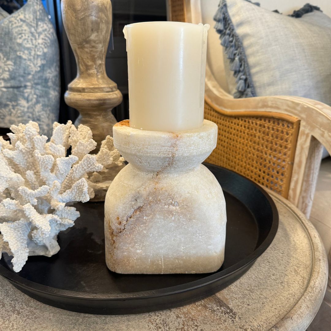 Add warmth and elegance to your space with the hand-carved Orvieto Onyx Candle Holder. Crafted from solid Onyx, this stylish piece provides a soft, diffused light that sets a soothing ambiance. Elevate your home decor with this must-have addition! Styled.