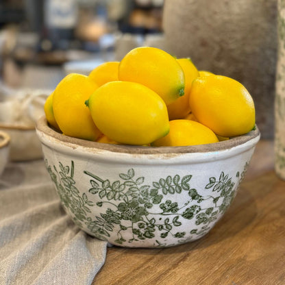 The vibrant Faux Lemon is the perfect option for crafting captivating decorations. Its striking burst of yellow adds a distinctive touch and texture, making it ideal for featuring alone in a bowl or as part of a larger display.