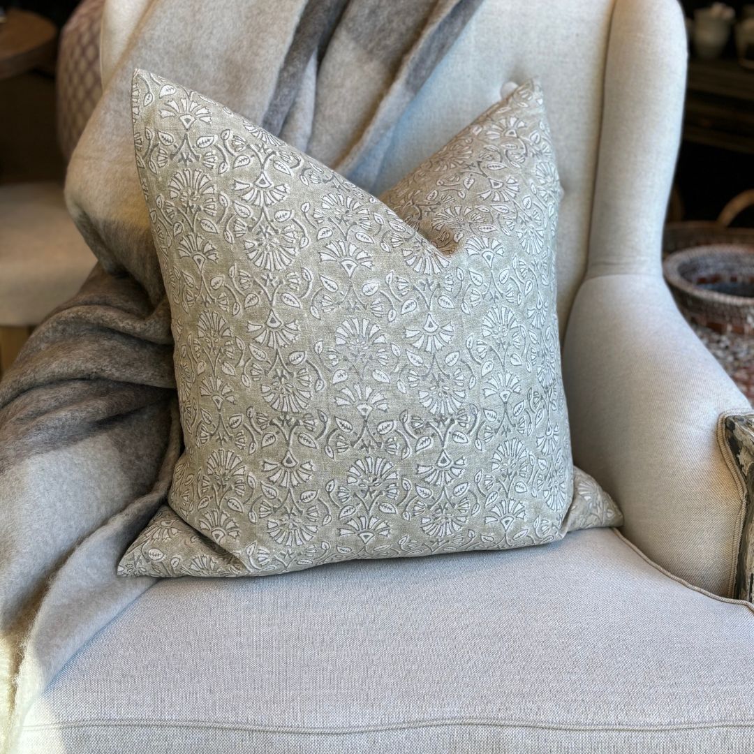 This Sumatra French Linen Light Grey Cushion has been crafted of premium, heavyweight French linen with an artisanal block-printing method to create uneven, textured effects. The light grey exterior features an oatmeal/natural flax linen finish, and comes with a plush feather-filled insert.