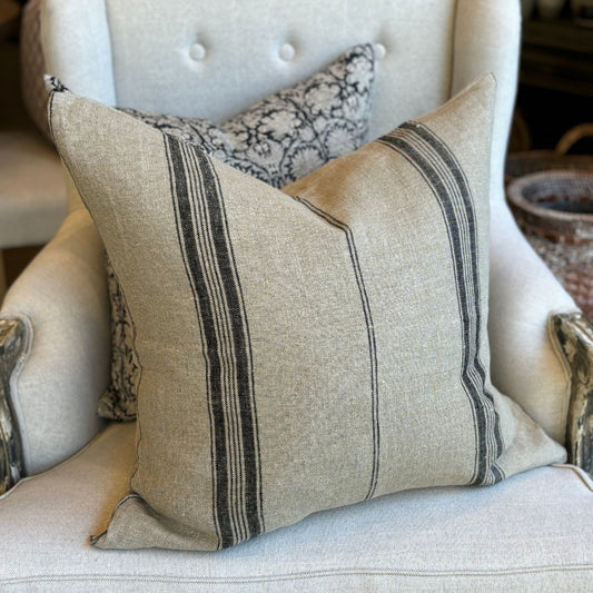 Bring a touch of rustic charm to your home with the Charcoal Stripe Rustic Linen Cushion. Measuring 55cm x 55cm, this cushion features a bold charcoal stripe on a warm brown background. Perfect for any style, this cushion comes with a cozy insert, ensuring comfort and style in one.