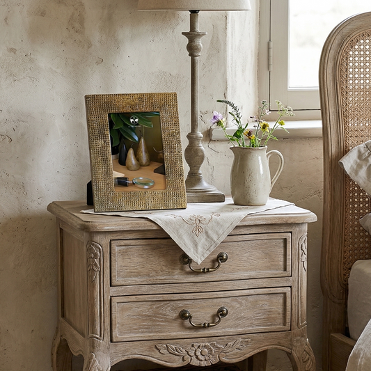 Brass frame on bedside table