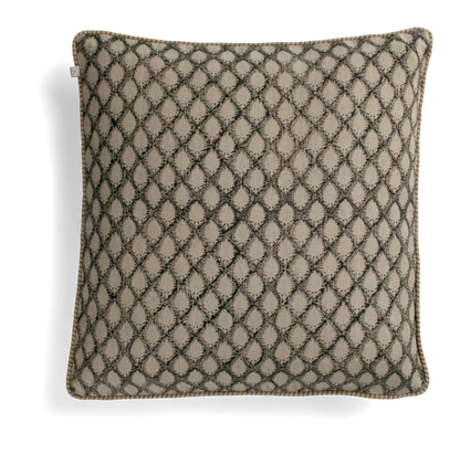 This elegant Cypress Block Printed Linen Black Cushion is hand block printed on soft, natural linen and adorned with delicate piping along the edges. Drawing inspiration from the luxurious textiles of the ancient Orient, it adds a touch of sophistication to any space. Crafted by the renowned Swedish brand, Chamois, this cushion is made with premium Belgian 100% linen and includes a soft feather insert. Front.