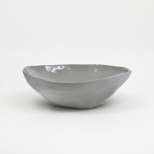Gray ceramic bowl on a white background