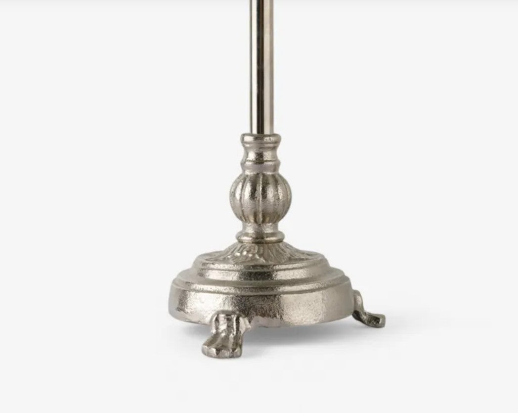 Decorative metal stand on a white background