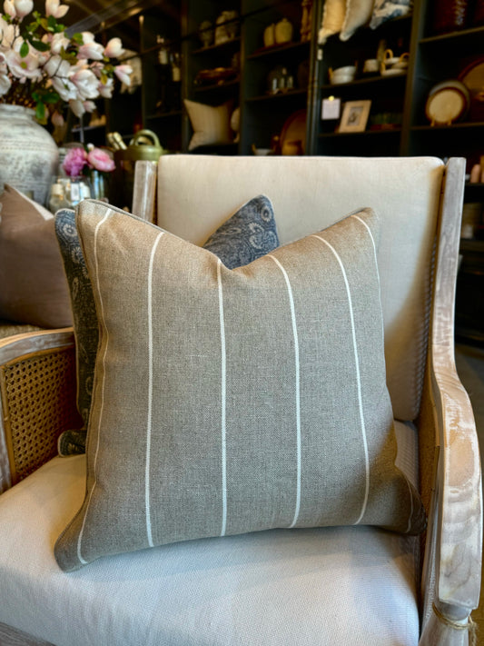 Indulgently fashioned from a luxurious, durable fabric, this exquisite Wortley Narrow Neutral White Stripe Cushion boasts a classic white stripe on a warm neutral background. It's the perfect timeless and graceful accent to elevate any home decor. Includes a luxurious feather insert.