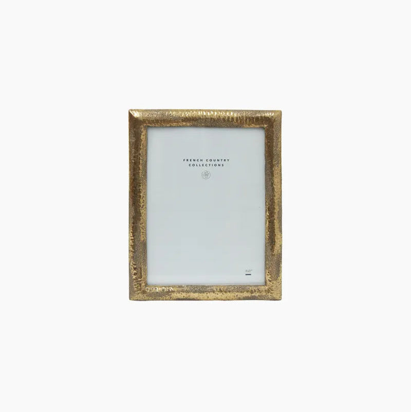 Transform your treasured photos with the Imperfect Hammered Gold Photo Frame. Its elegant design radiates sophistication and enchantment, providing the ideal backdrop for your cherished memories!

Dimensions: &nbsp; 16cmL x 20cmH