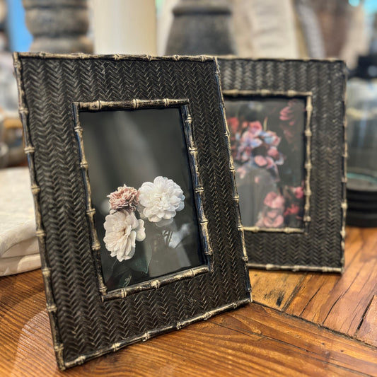 The Matteo Dark Rattan Photo Frame with bamboo-inspired edging is an ideal choice for showcasing cherished photographs. Front