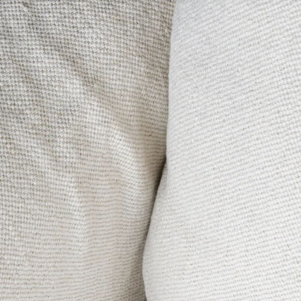 Close-up of textured beige and white fabric