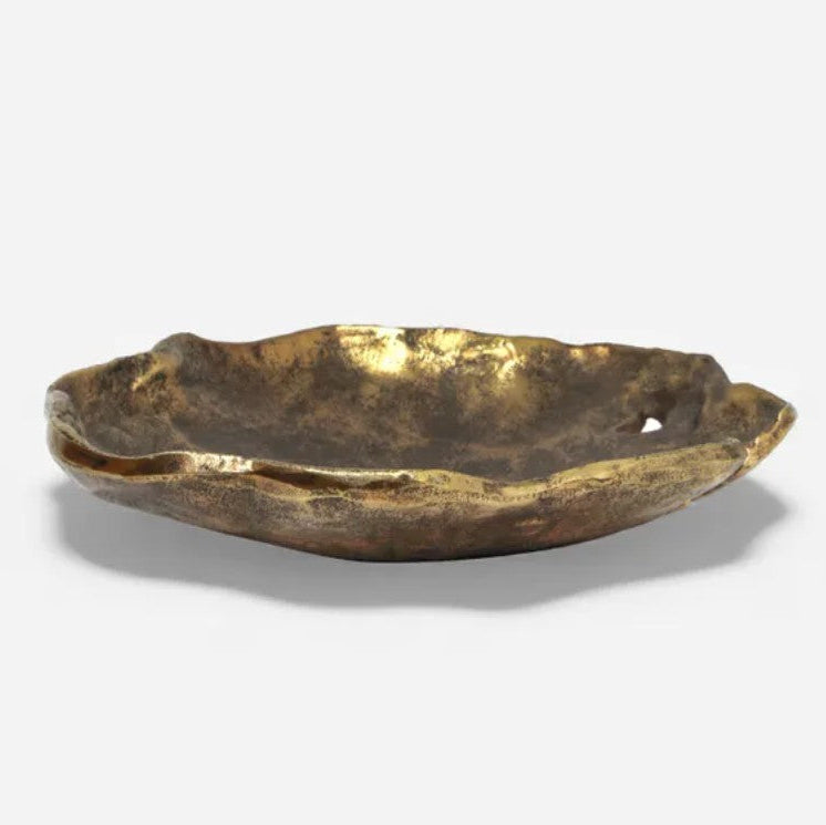 Gold decorative plate on a white background