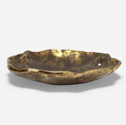 Gold decorative plate on a white background