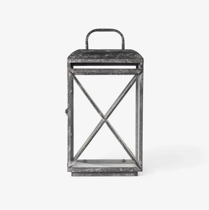 The Jardin Lantern in Aged Grey features a burnished silver finish, blending timeless elegance with a subtle modern touch. Perfect for brightening your indoor or sheltered outdoor areas, this classic piece is part of French Country’s exquisite lantern collection.

Dimensions: 44.5cm L x 34cm W x 61cm H