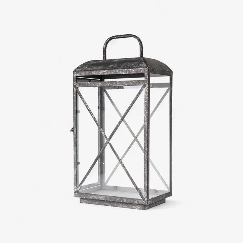 The Jardin Lantern in Aged Grey features a burnished silver finish, blending timeless elegance with a subtle modern touch. Perfect for brightening your indoor or sheltered outdoor areas, this classic piece is part of French Country’s exquisite lantern collection.

Dimensions: 44.5cm L x 34cm W x 61cm H