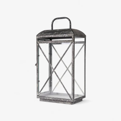 The Jardin Lantern in Aged Grey features a burnished silver finish, blending timeless elegance with a subtle modern touch. Perfect for brightening your indoor or sheltered outdoor areas, this classic piece is part of French Country’s exquisite lantern collection.

Dimensions: 44.5cm L x 34cm W x 61cm H