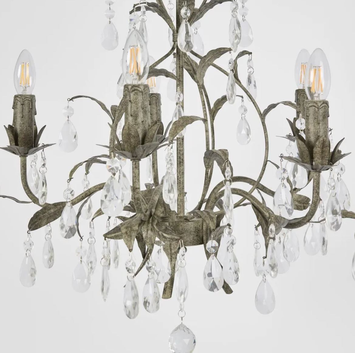 close up of crystal & iron chandelier