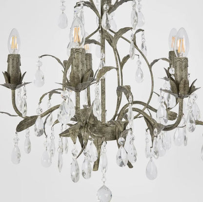 close up of crystal & iron chandelier