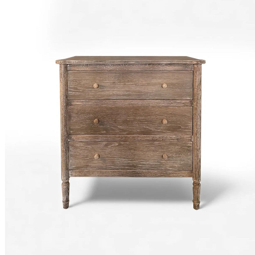 Wooden dresser with a weathered finish on a white background