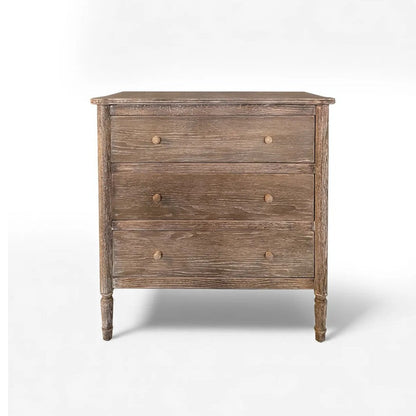 Wooden dresser with a weathered finish on a white background
