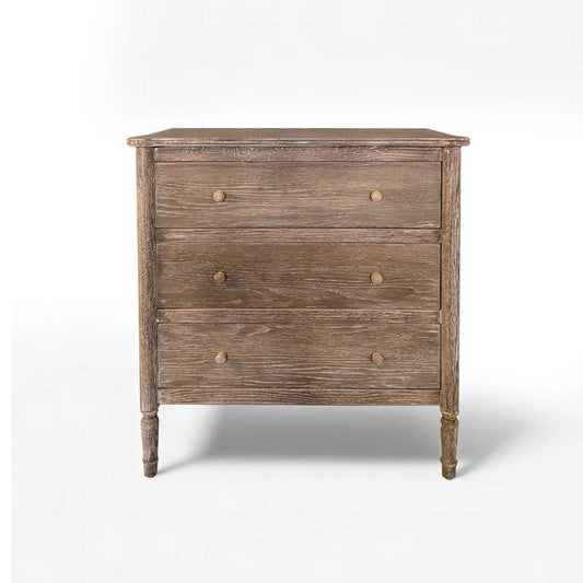 Wooden dresser with a weathered finish on a white background