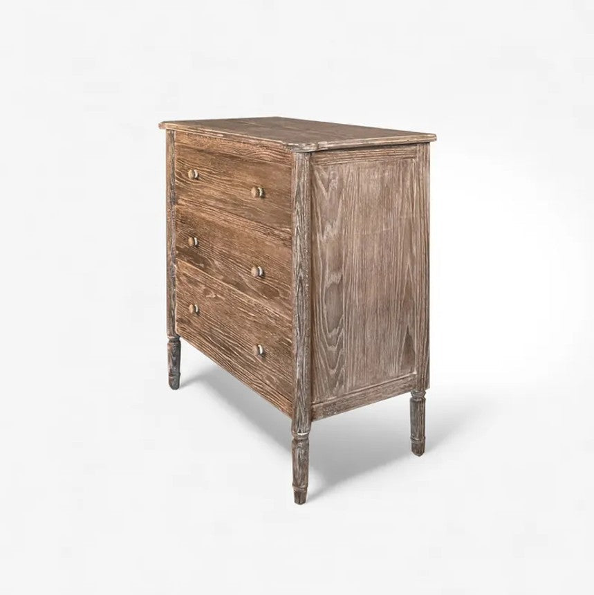 Wooden dresser with three drawers on a white background