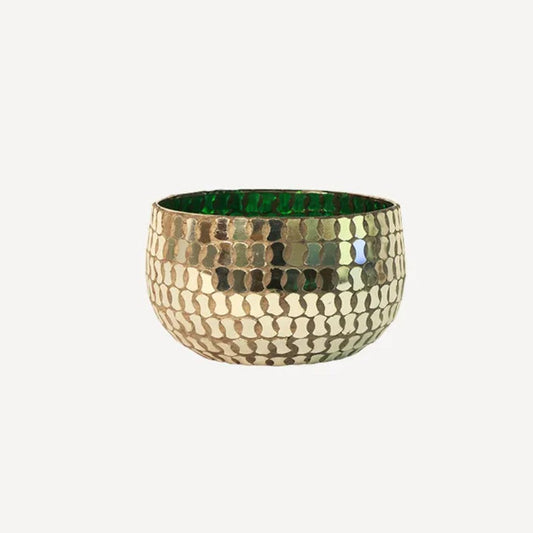Gold textured candle holder on a white background