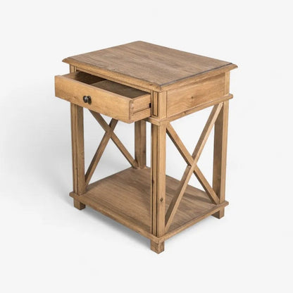 Wooden side table with a drawer on a white background