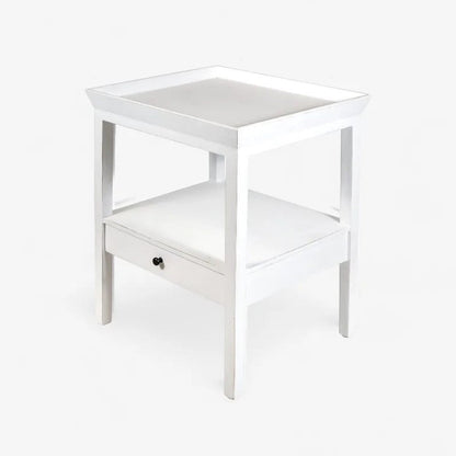White side table with a drawer on a white background