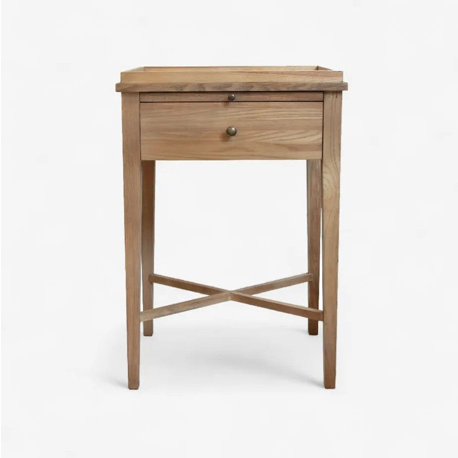 Wooden side table with a drawer on a white background