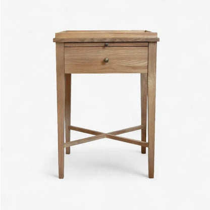 Wooden side table with a drawer on a white background