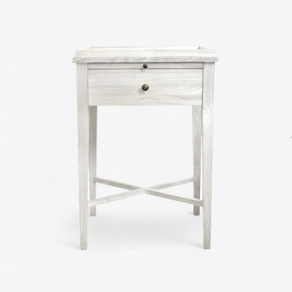 White wooden side table with a drawer on a white background