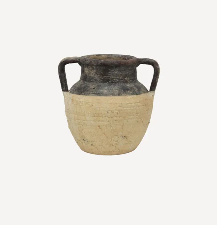 Ceramic vase with black rim and handles on a white background