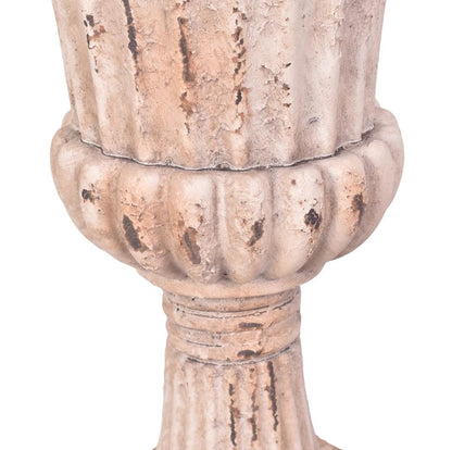 Decorative column capital with intricate detailing on a white background