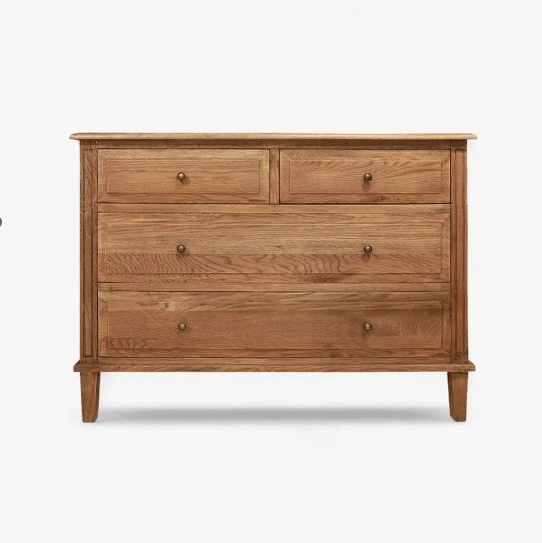 Wooden dresser with multiple drawers on a white background