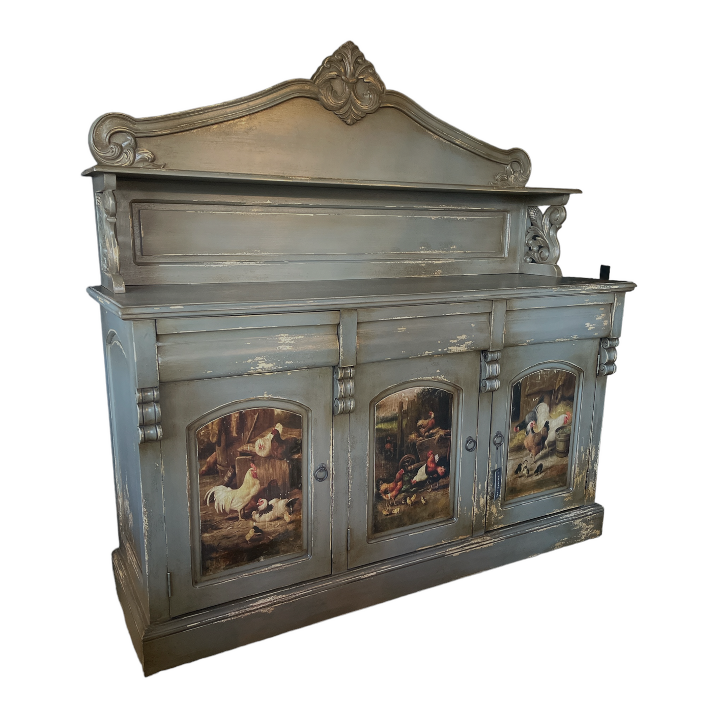 Gifted artisans in Java have crafted this one-of-a-kind furniture piece that boasts a lightly-distressed, aged look with hand-painted chickens. Meticulously carved from mahogany, this exquisite item is certain to be a cherished family heirloom. It features 3 doors and 3 drawers. Front