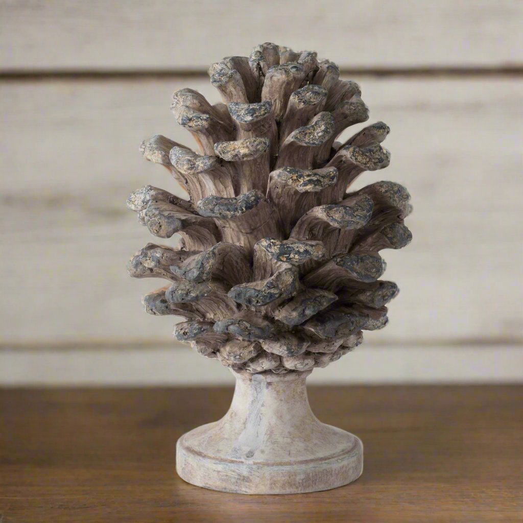 This lovely pine cone ornament will enhance your home's decor. Place it anywhere you would like to add a natural touch to your home. 