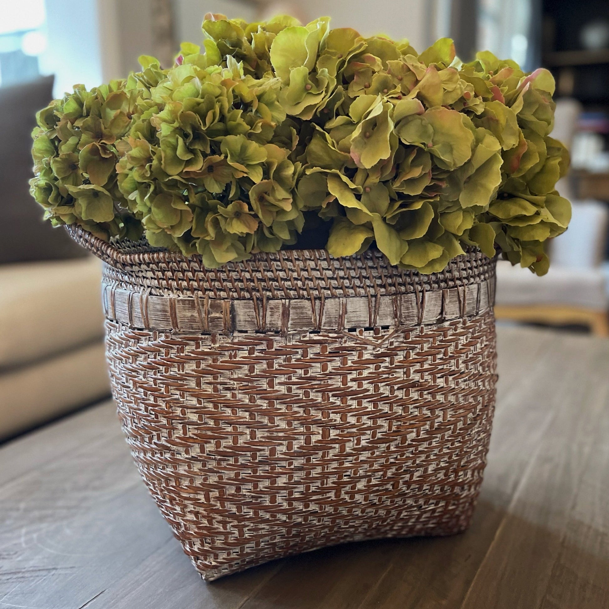 This traditional Ambon Handcrafted Whitewashed Basket hailing from a number of remote East Indonesian Island Villages, offers age-old charm, practical additional storage and stylish texture and warmth to your home. Florals styled.