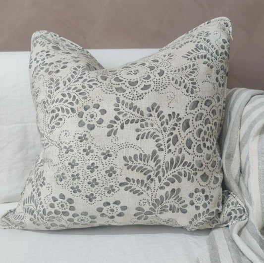 Effortlessly blend design and fabric with this stunning Foliage Taupe & Grey Linen Cushion. Made from a luxurious blend of 50% cotton and 50% linen, the invisible zipper adds a touch of elegance to its French-inspired style.