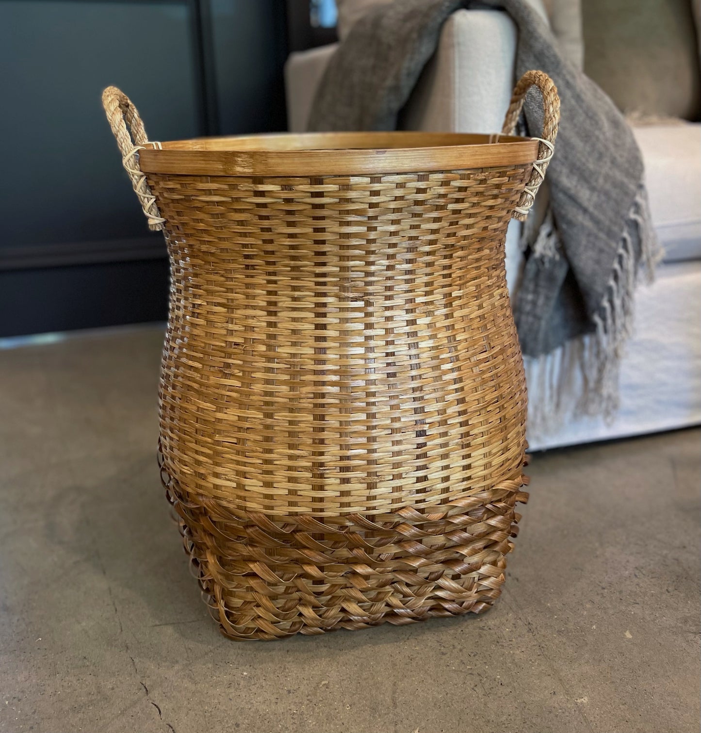 The attractive yet functional Fitri Handcrafted Bamboo Basket with handles is made in the South East Asia Islands in a design handed down from generation to generation. Styled.