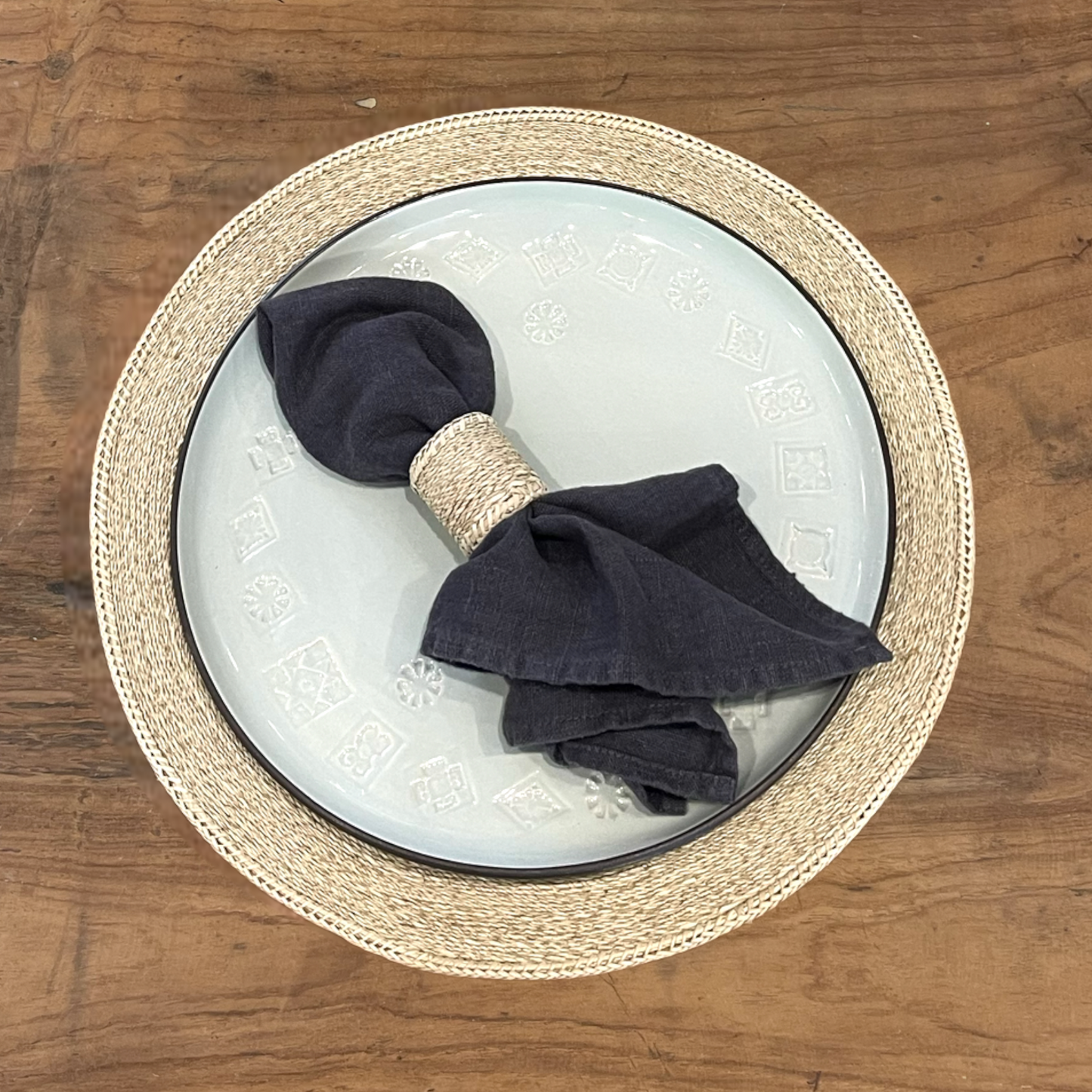 Our Handwoven Pandan Natural Round Placemat offer a great way to both decorate and protect your table. Styled.