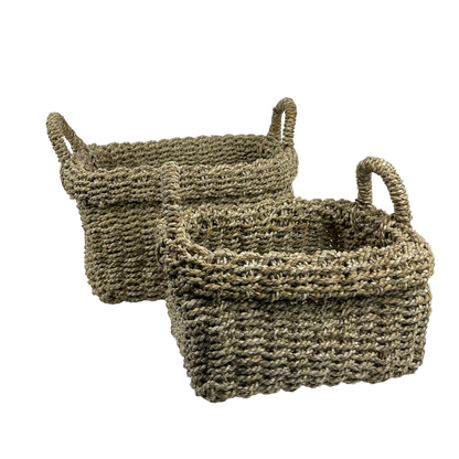 Tightly handwoven from seagrass, our Saudari Seagrass Baskets feature sturdy handles which add charm and understated style. Use to display indoor plants or for a wide range of storage options.