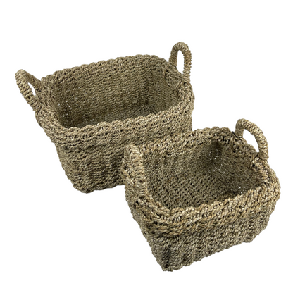 Tightly handwoven from seagrass, our Saudari Seagrass Baskets feature sturdy handles which add charm and understated style. Use to display indoor plants or for a wide range of storage options. Top view.