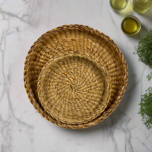 Made from Water Hyacinth, the Baru Woven Tray features a broad weave that exudes a relaxed and natural aesthetic. Its intricate design adds texture and an organic touch to any room. Top