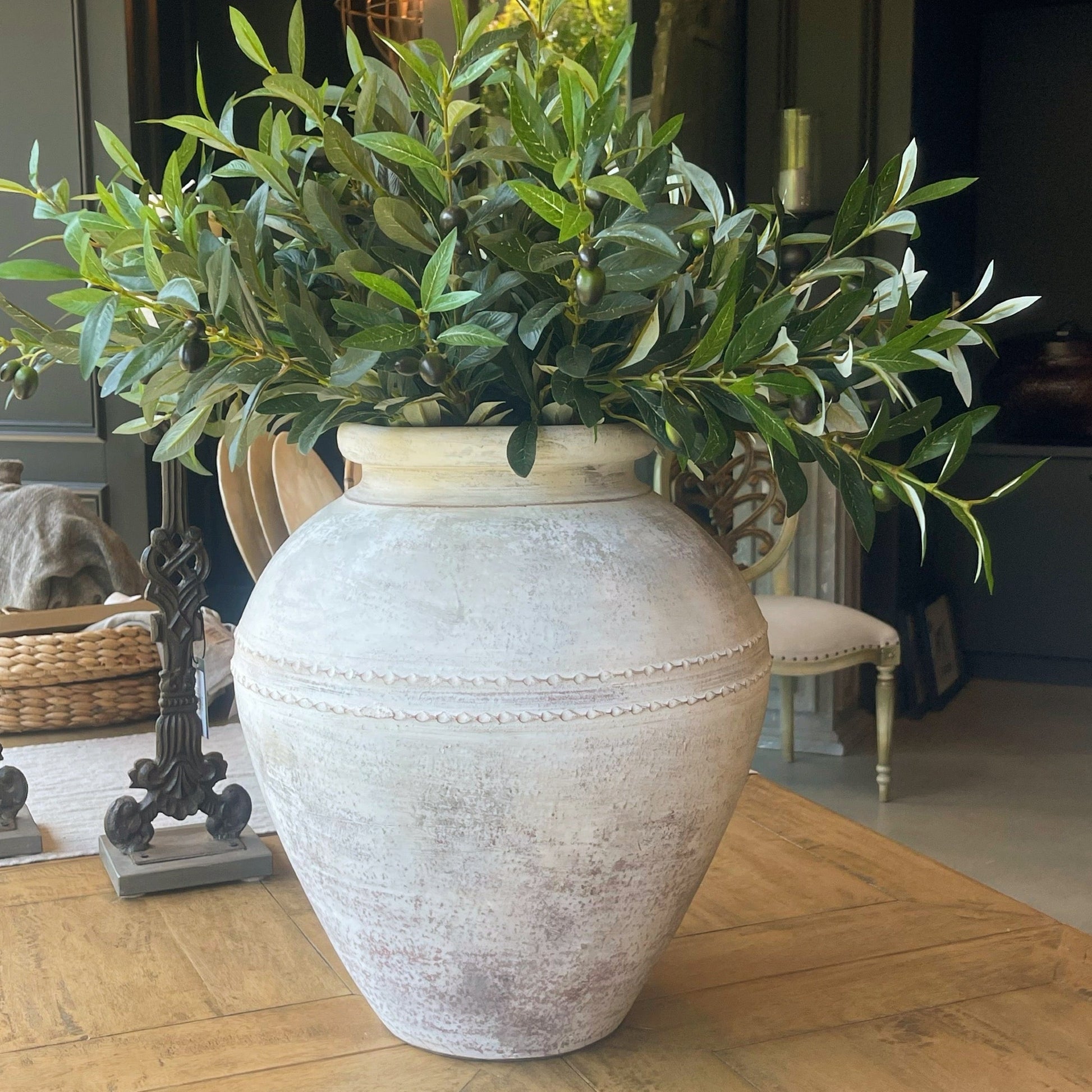 Expertly crafted and showcasing an eye-catching limewashed aged exterior, the Terracotta Pot is a stunning addition to any display, whether filled with florals or greenery or simply standing alone as a statement piece.