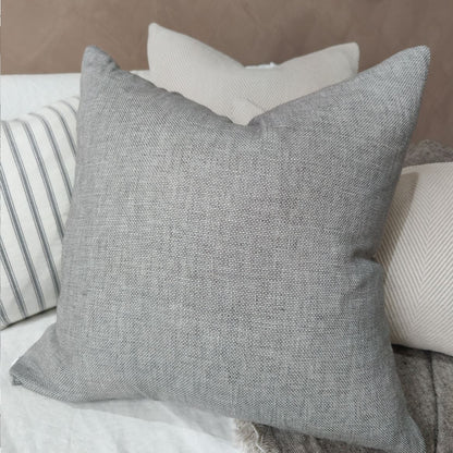 Made from heavyweight yarn dyed French linen, the Lisbon French Linen Grey Cushion features a unique texture and luxurious feel and features a plush feather fill.