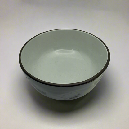 Add a subtle elegance to your dinner table with the Domah Light Blue Cereal Bowl. Its lightly-coloured design is accented with distinctive grey edges and features the unique symbolism of Indonesian archipelagos. Crafted exclusively by HOME by MB, this bowl offers a timeless look that instantly upgrades any home décor. Top.