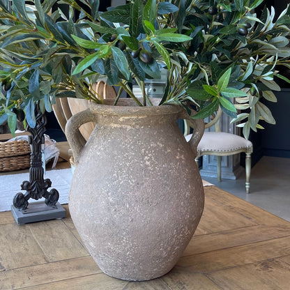 With a classic, traditional shape, this textured vase has a rustic pared-back look giving this decorative piece character.