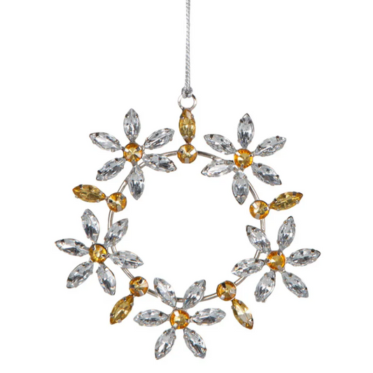 Add a touch of elegance to your tree with our stunning gold and silver snowflake ornament.