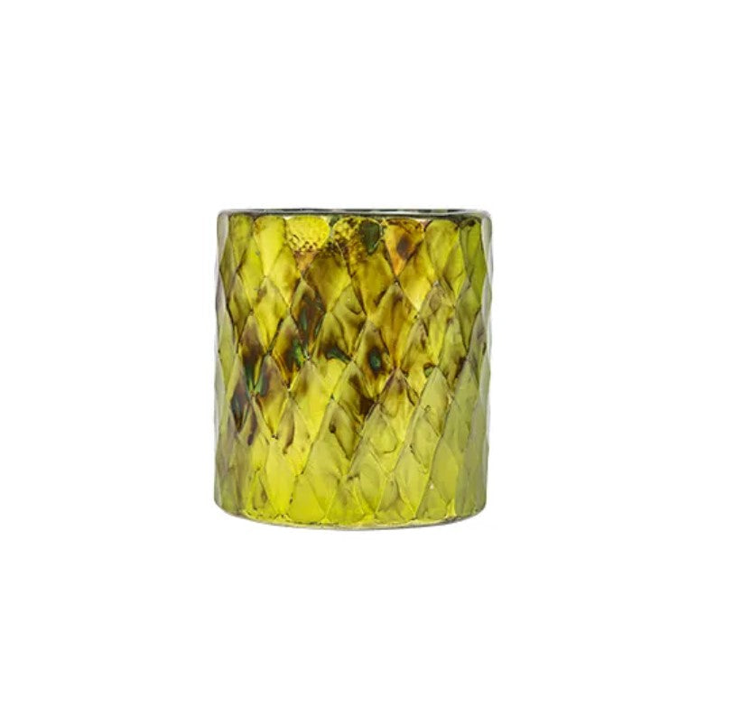 This individual piece is blown by hand with barfi cut glass detailing in lime oxidised tones. Use this hurricane as a candleholder around the home to add warmth and luxury.