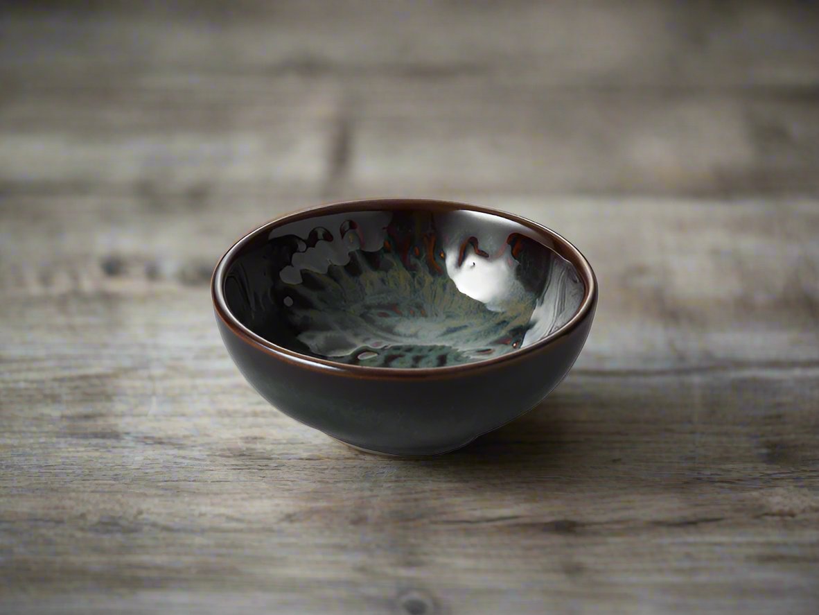 The small dip bowls are a fantastic serving accessory for the table...dips, olives, nuts come to mind. They sit beautifully on the various serving pieces in the collection and the colours can be mixed for a casual look. 